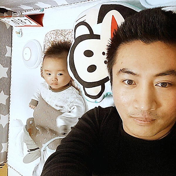 Sungmin Lim, CTO of WOOAZ Inc., with a baby